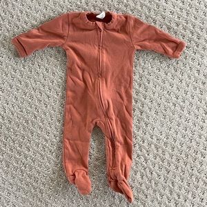 Kate Quinn footed bodysuit